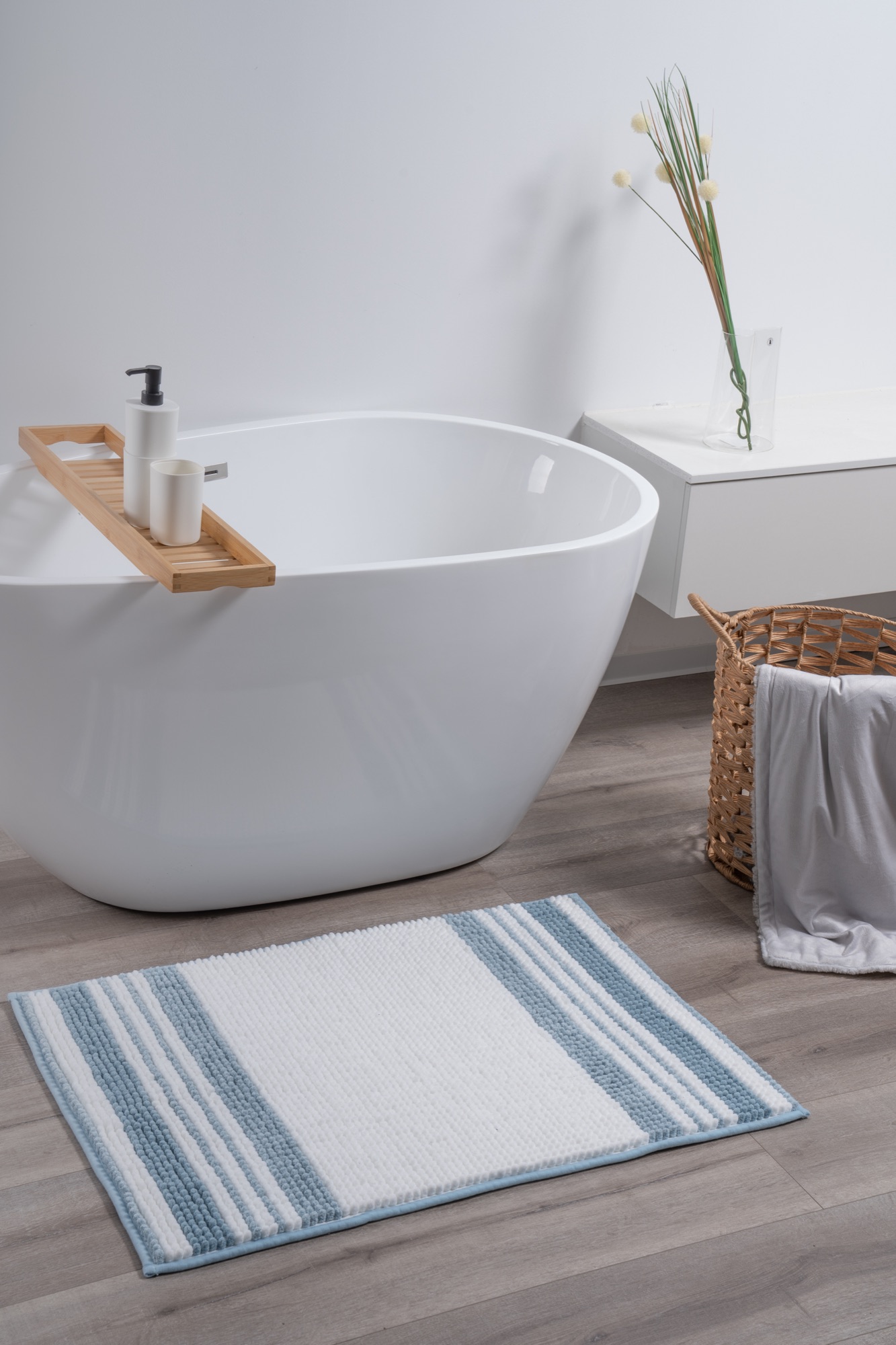 Blue and white striped bath mat by ABS International
