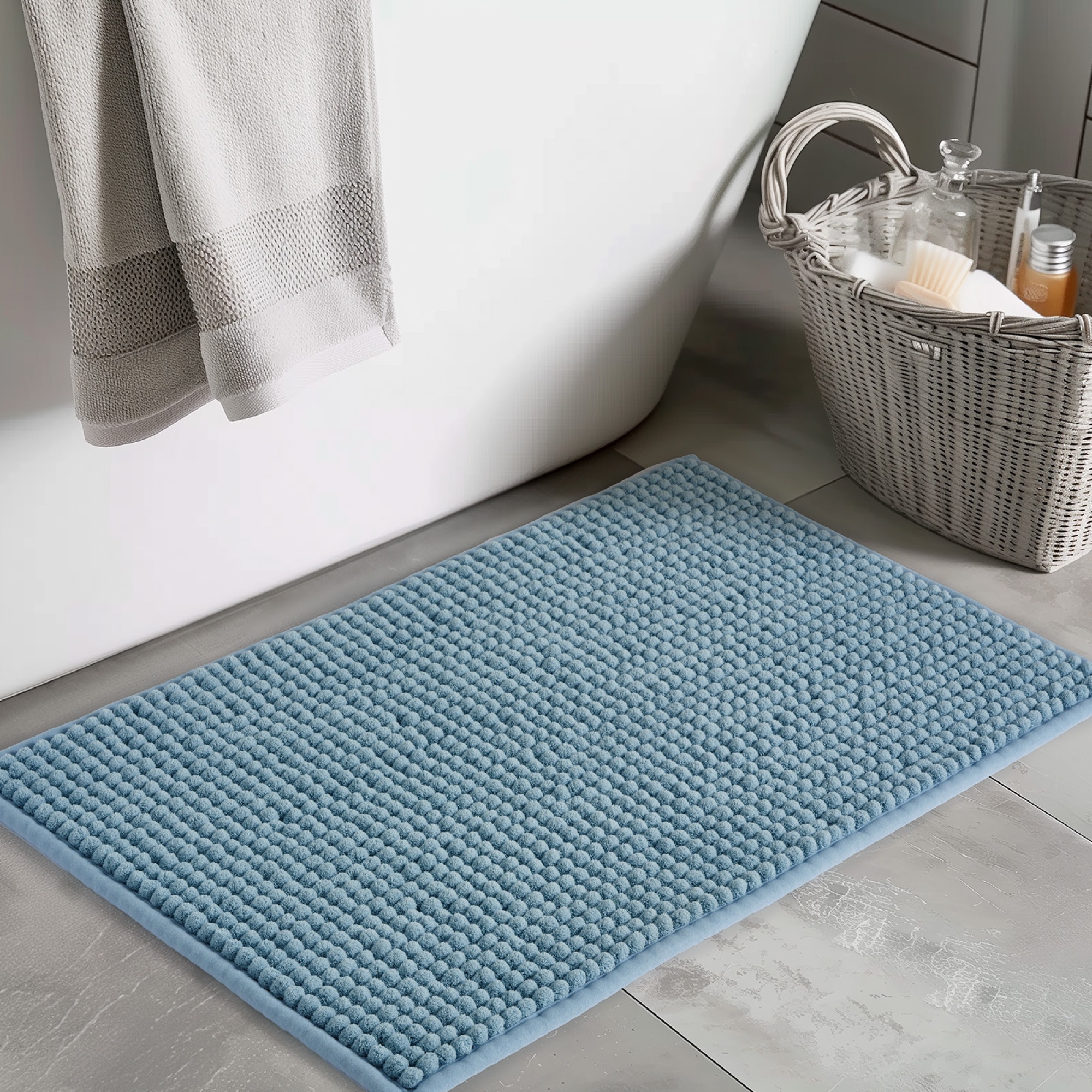 ABS bath mat — stone-blue chenille bath mat beside a tub