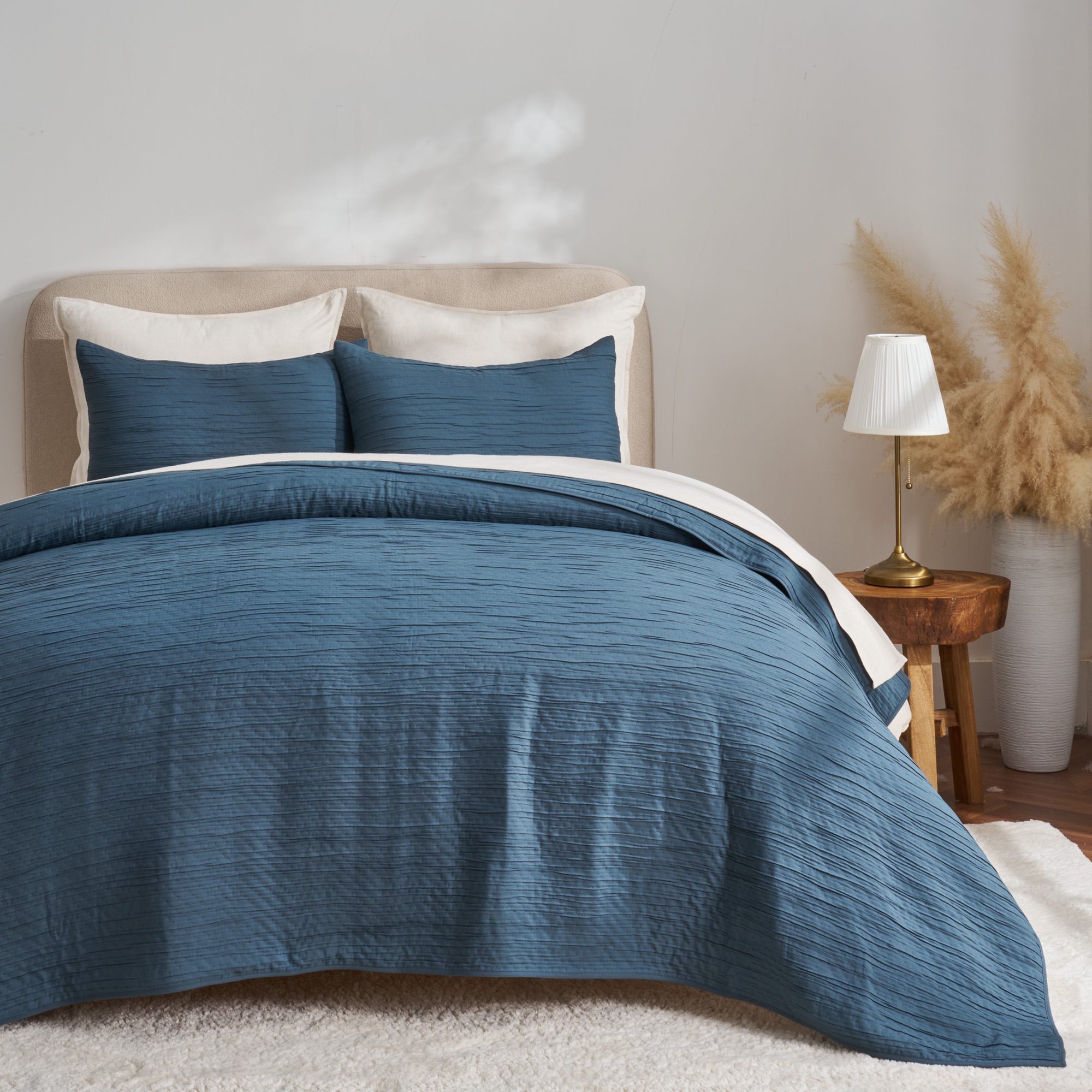 Denim blue crinkle-texture quilt by ABS International