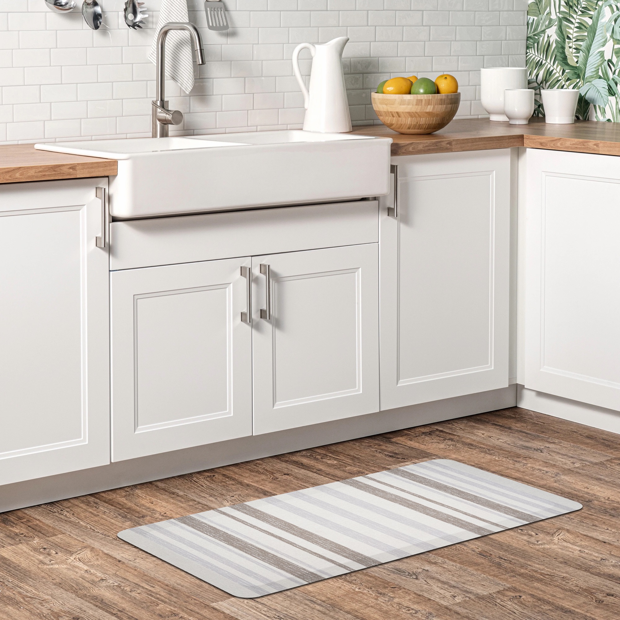 Grey and white striped kitchen mat by ABS International