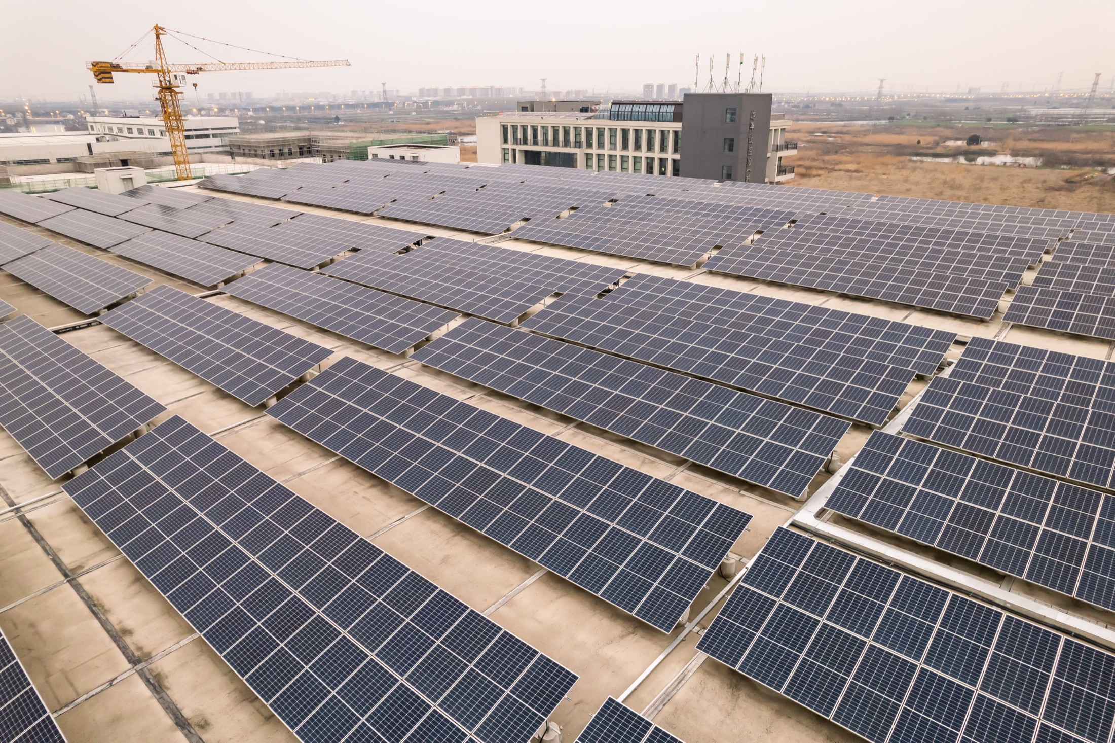 Aerial view of the ABS rooftop solar array powering the facility